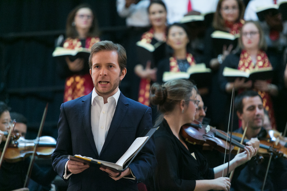 Countertenor Benjamin Williamson performing with Qatar Concert Choir